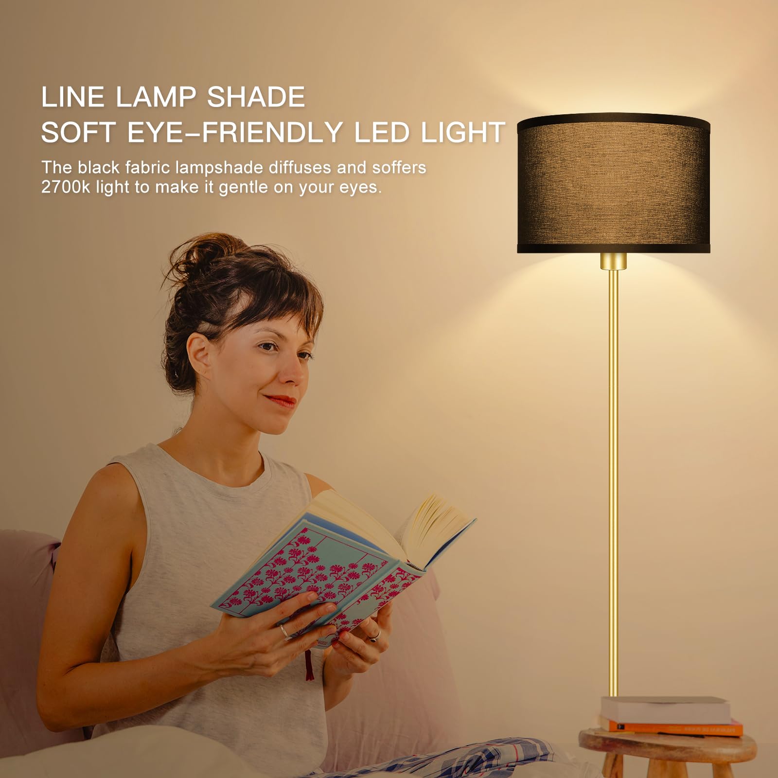 AUQUEE gold floor lamp black shade closeup highlights soft lighting and shade texture.