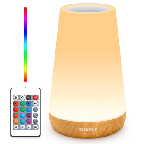 Auxmir LED night light with top touch control for quick adjustments.