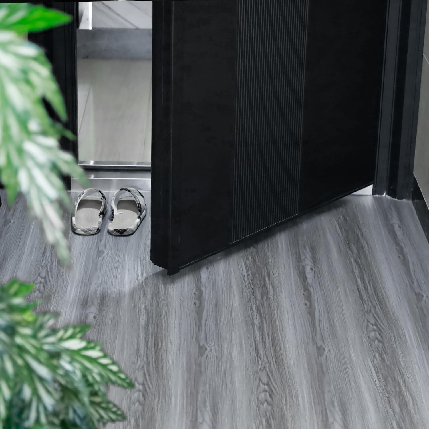 auxua roll-up floor tiles demonstrating easy handling and compact storage.