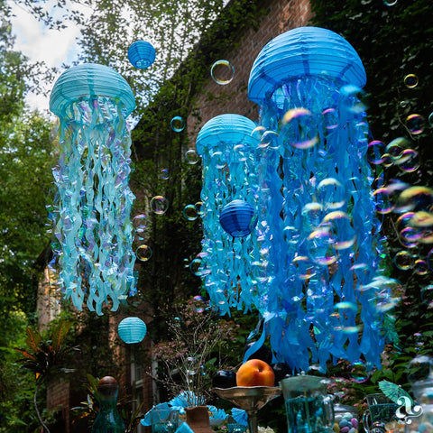 Avoseta blue bubble lanterns provide soft illumination for outdoor setups