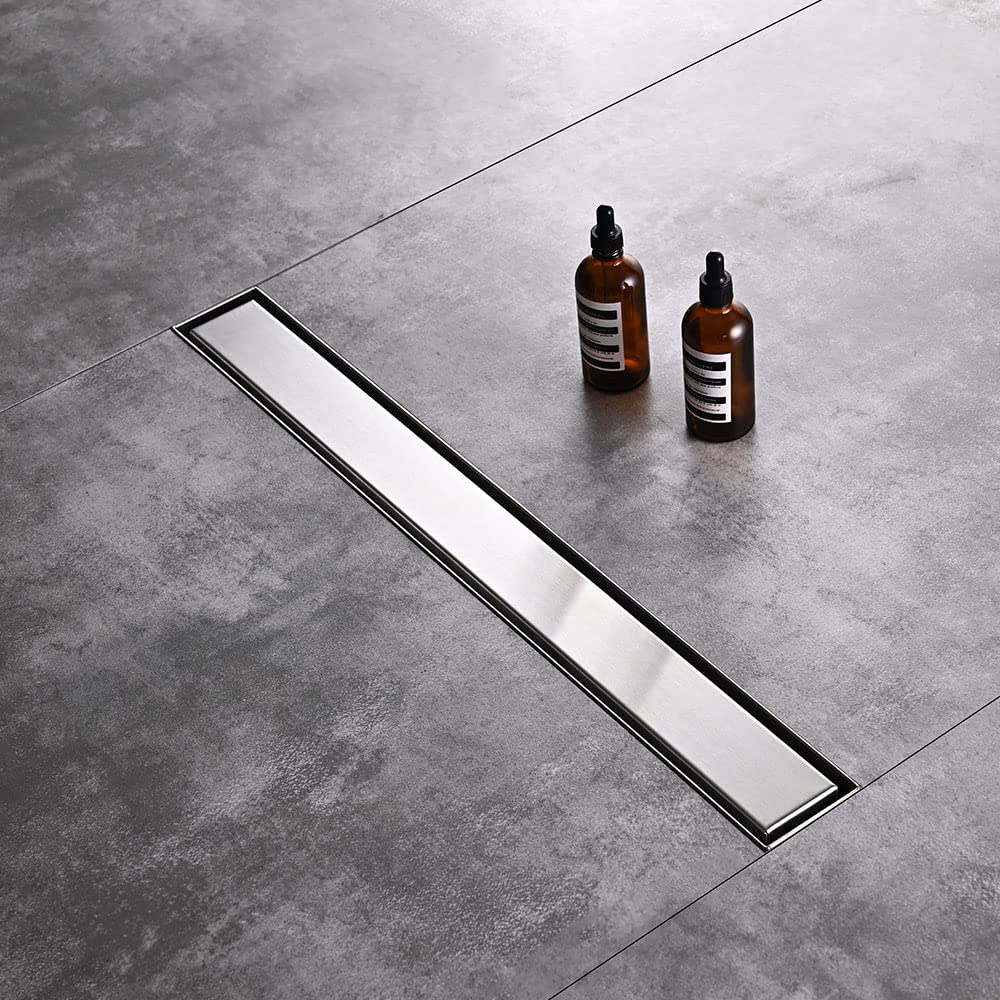 Tile-in pattern drain cover from AVSIILE showing seamless integration.