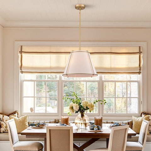 AXILAND gold metal cage frame adds industrial-modern flair to dining spaces.