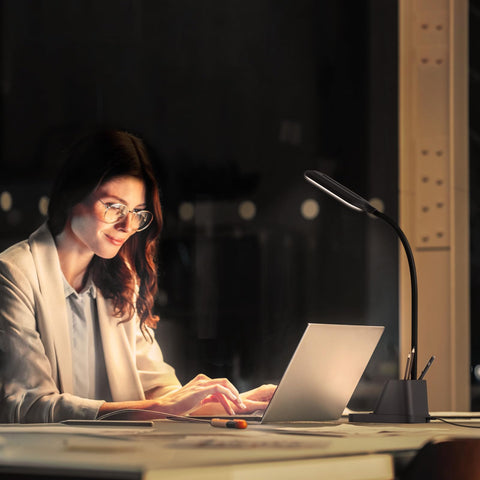 AXX LED lamp delivers 650 lumens for bright desk illumination.