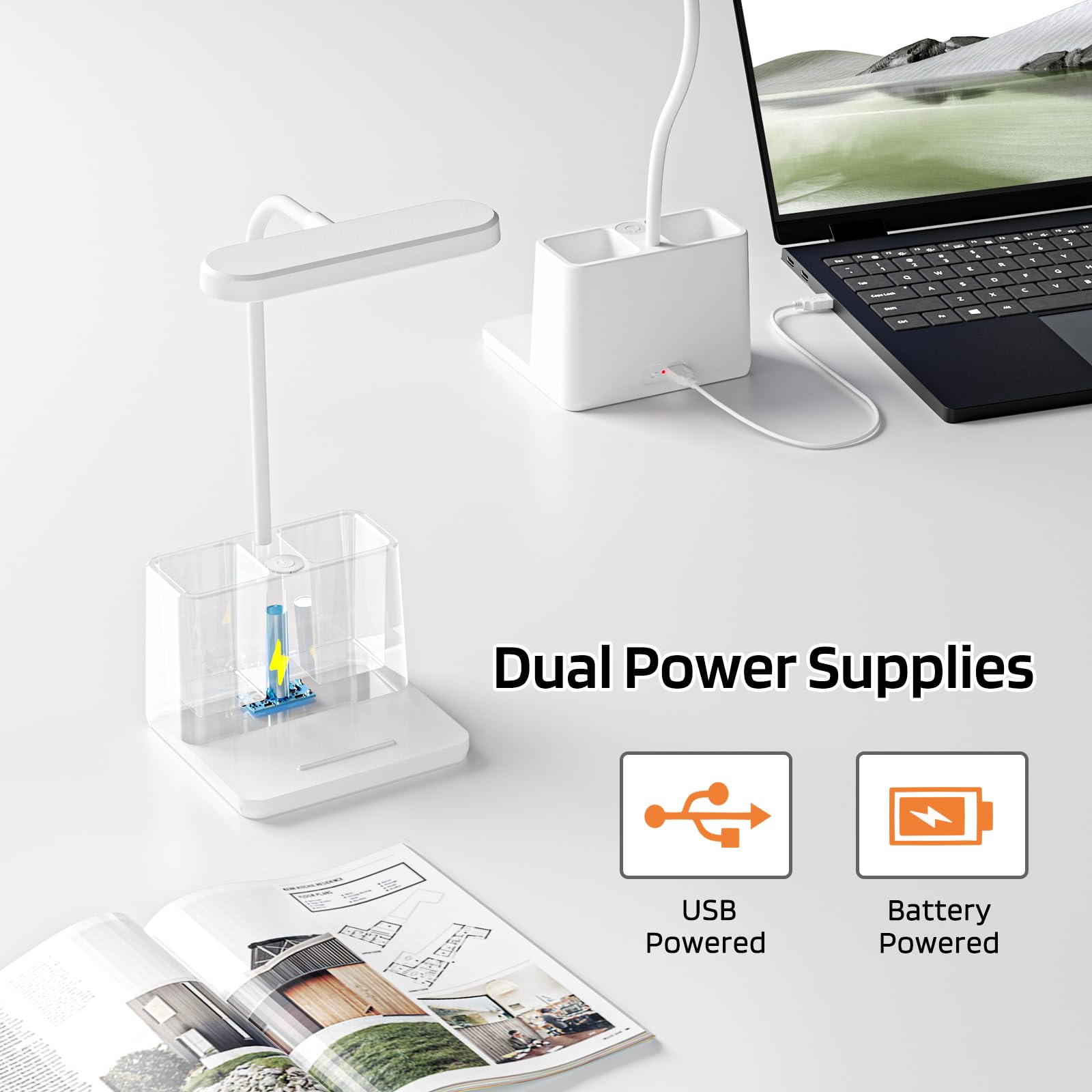 AXX white mini desk lamp placed on a keyboard for compact setup