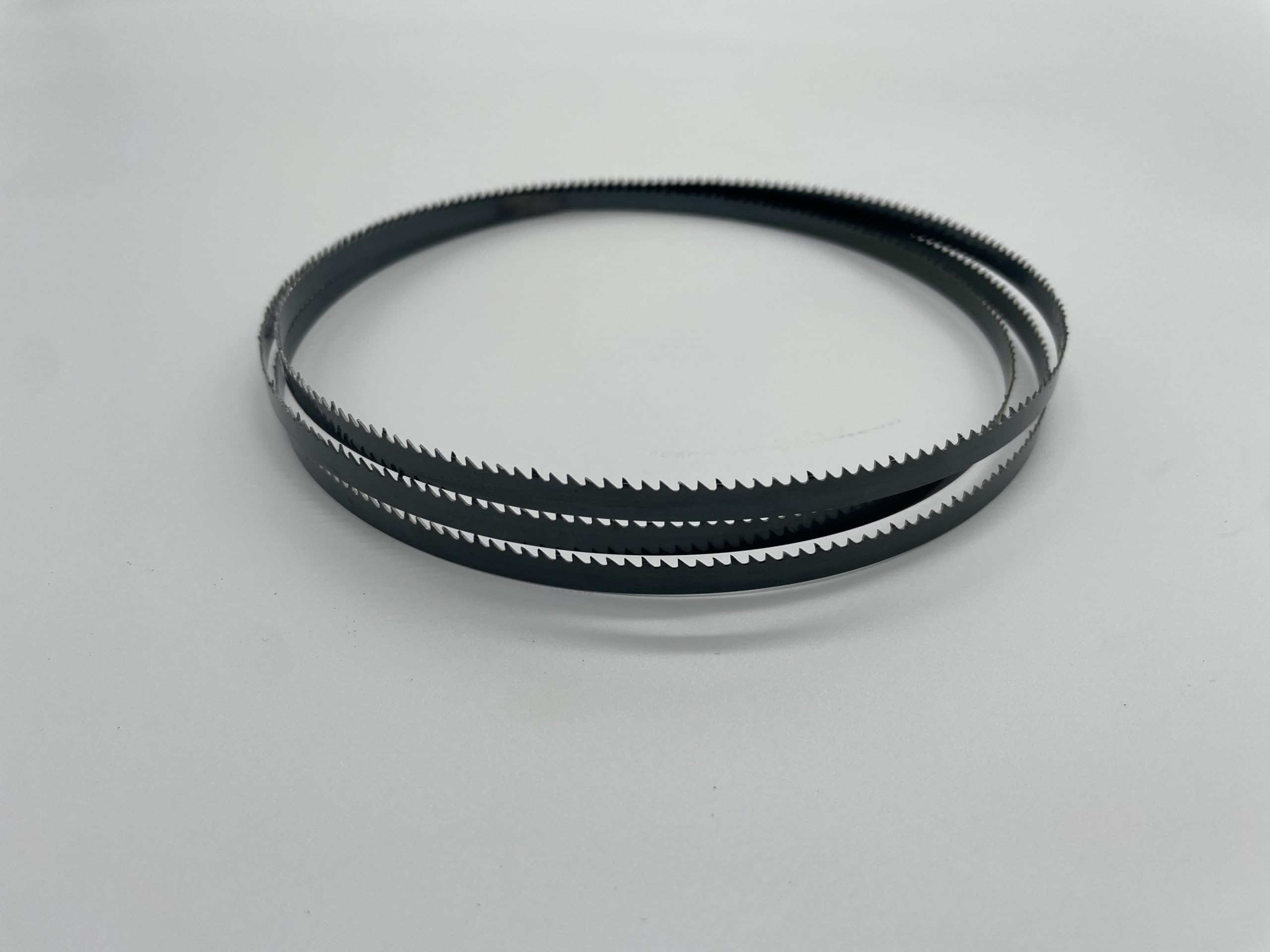 AYAO ground teeth blade close-up for sharper, longer-lasting cuts.