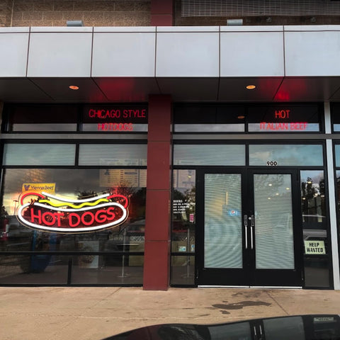 Balanar HOT DOGS LED sign with bright glow enhances the dining atmosphere.