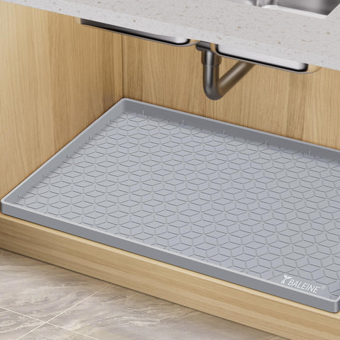 BALEINE under-sink mat grey wide shot protects cabinets from spills