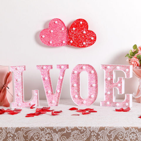 Baquler Valentines party or wedding decor enhanced by pink letters