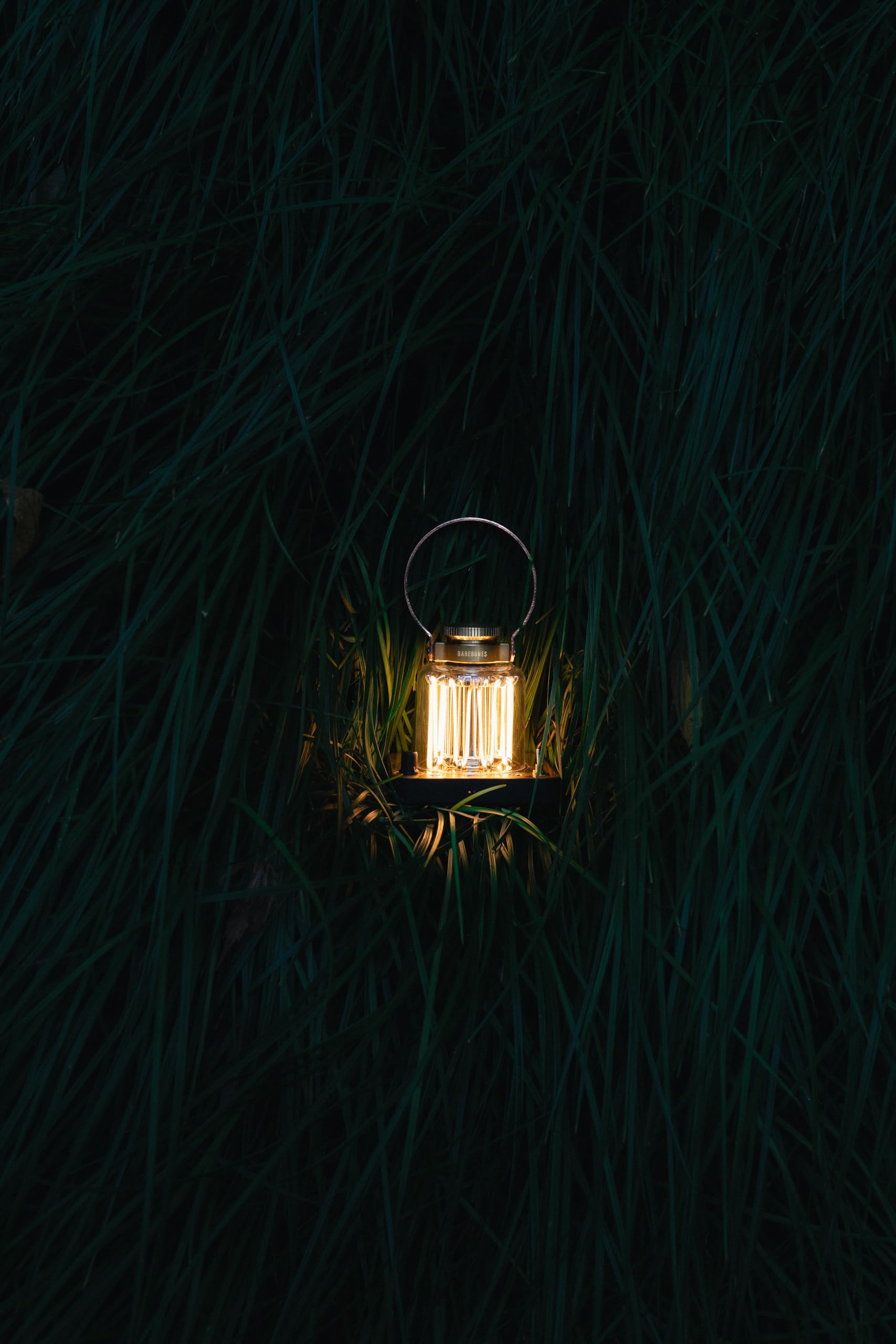 Rubber feet stabilize Barebones Block Tower Lantern on uneven surfaces.