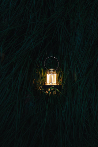 Rubber feet stabilize Barebones Block Tower Lantern on uneven surfaces.