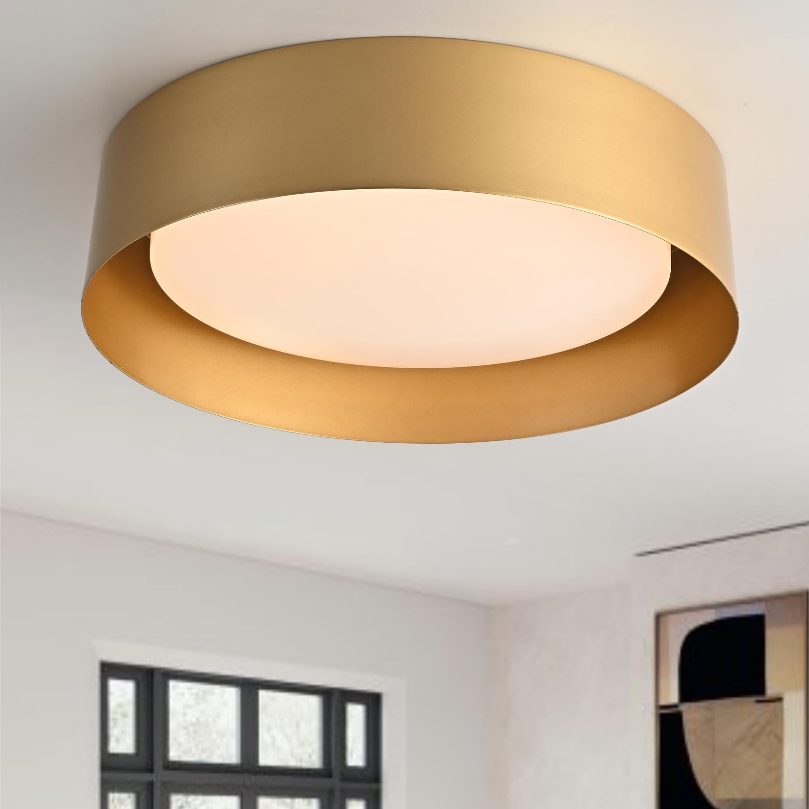 Bargeni flush mount light with polished gold finish enhances entryways and living spaces.