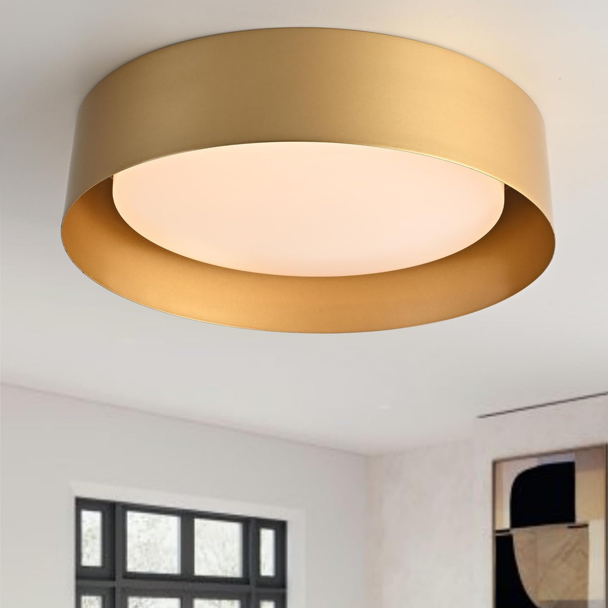 Bargeni flush mount light with polished gold finish enhances entryways and living spaces.