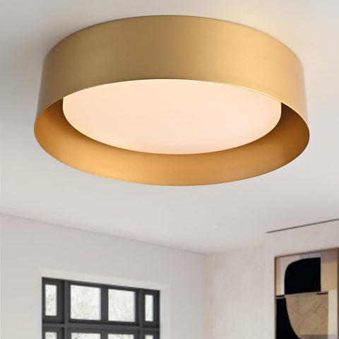 Bargeni flush mount light with polished gold finish enhances entryways and living spaces.
