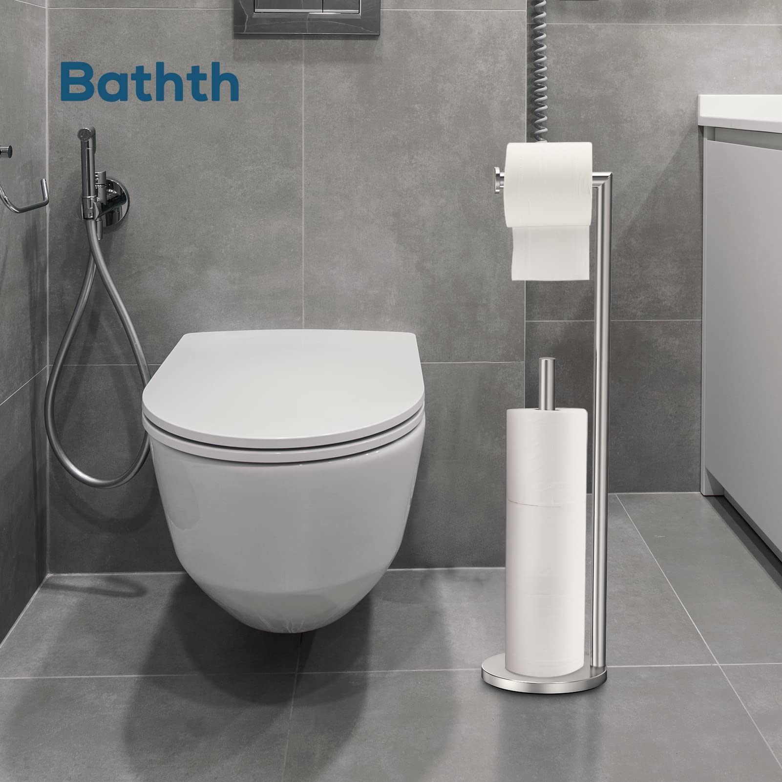 Bathth stand with three spare rolls visible, ready for refill during busy mornings.