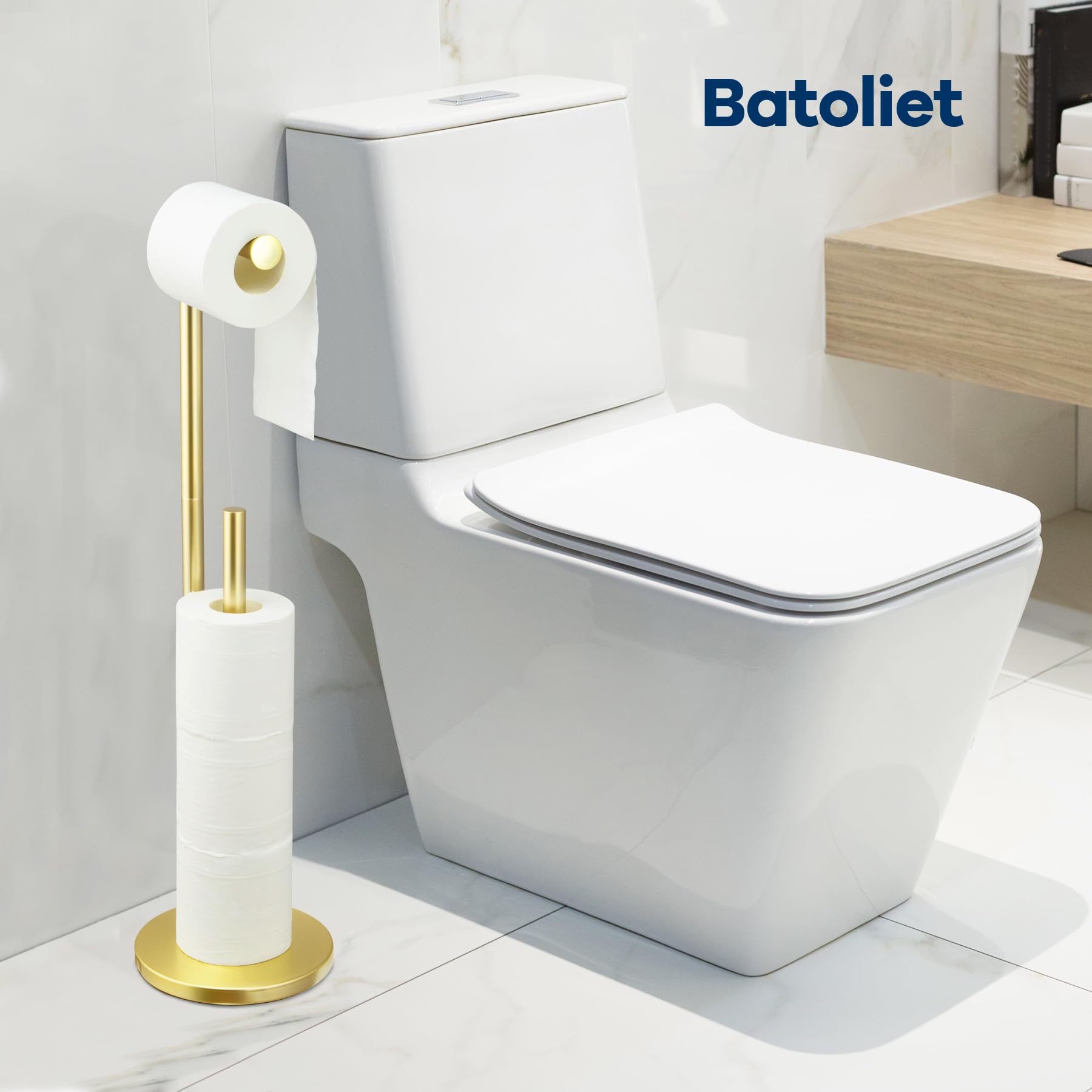 Batoliet gold stand with integrated storage shelf for extra toilet paper.