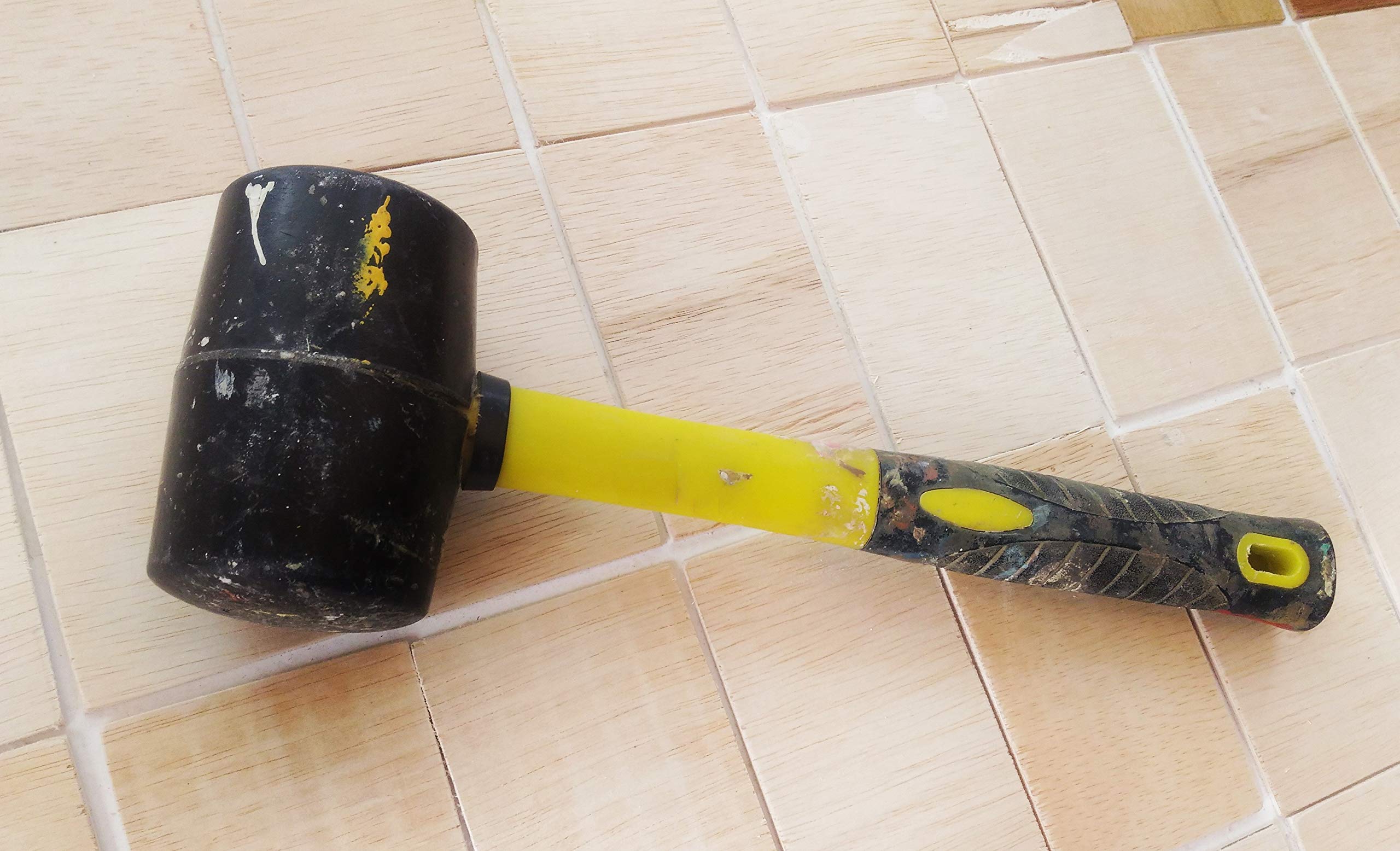 Benchmark rubber mallet ergonomic grip promotes comfortable handling during jobs.