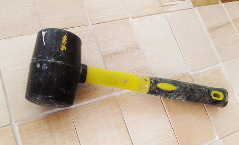 Benchmark rubber mallet ergonomic grip promotes comfortable handling during jobs.