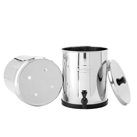 Water pours into a glass from a Berkey system for clean taste.