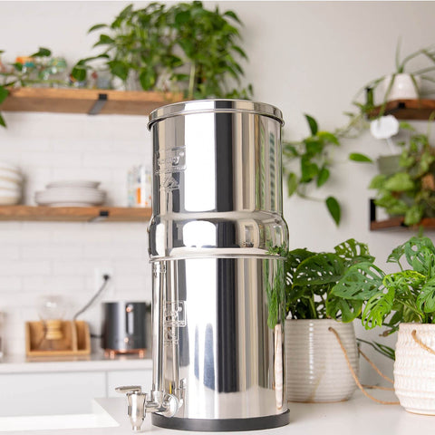 Pouring filtered water from the Berkey into a glass