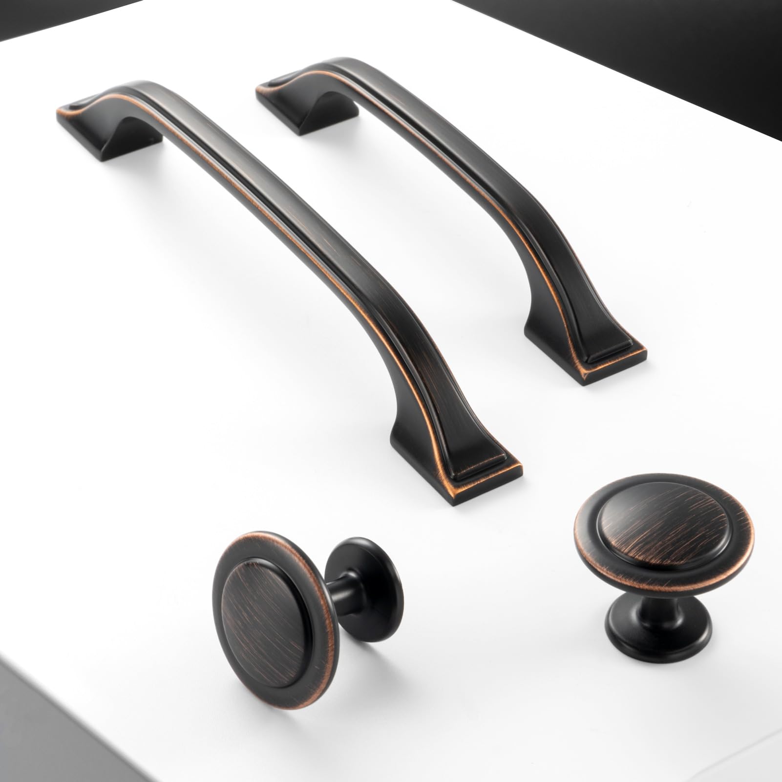 Installed BEROSSA bronze cabinet pulls enhance kitchen and bath spaces