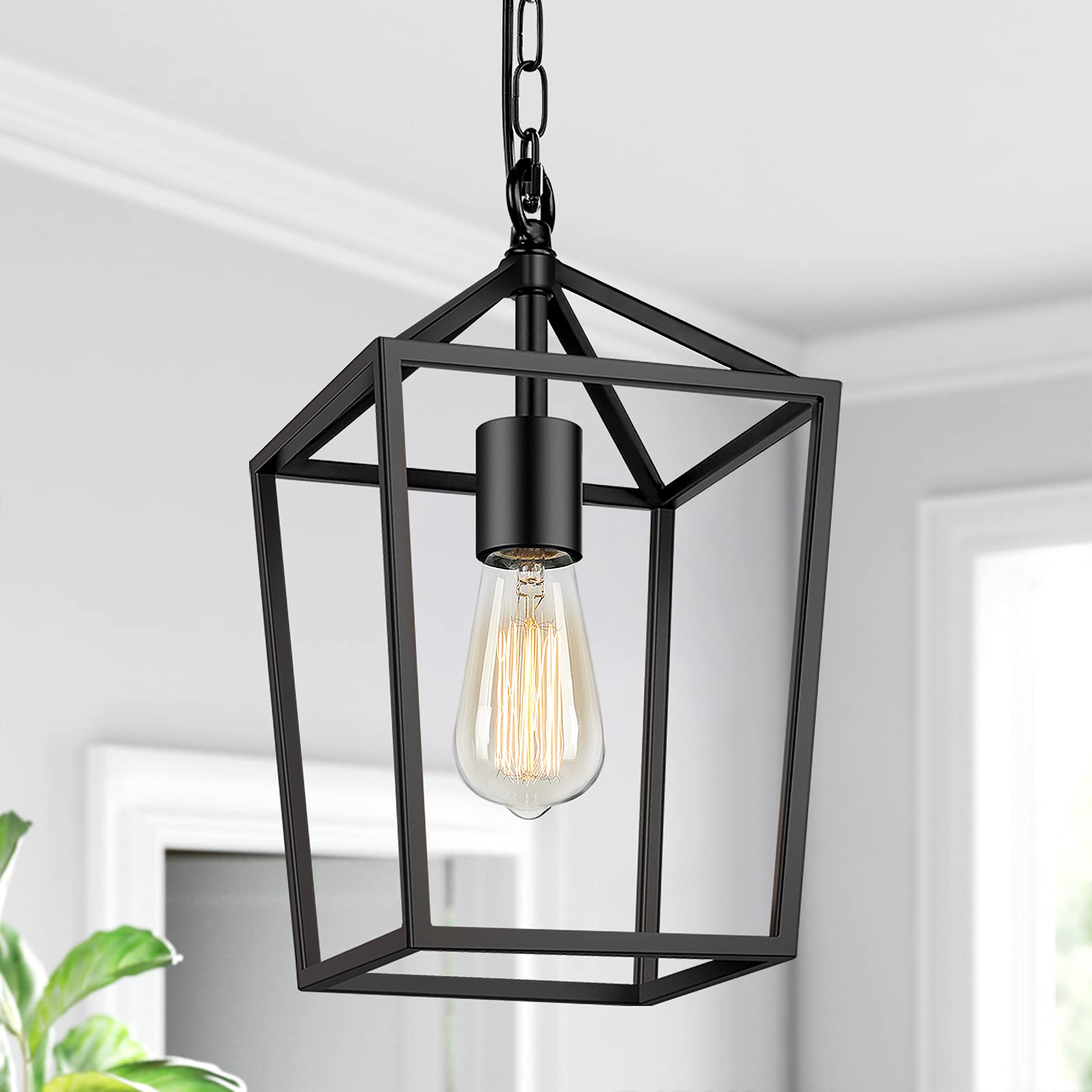 BesLowe farmhouse black pendant light over a kitchen island provides focused illumination.