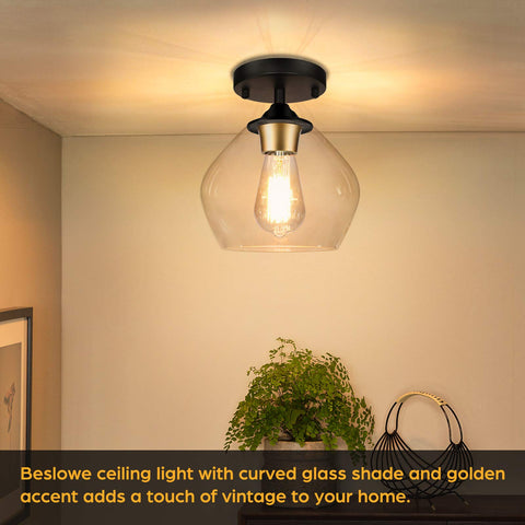 BesLowe industrial close-to-ceiling light with black finish and gold accent.