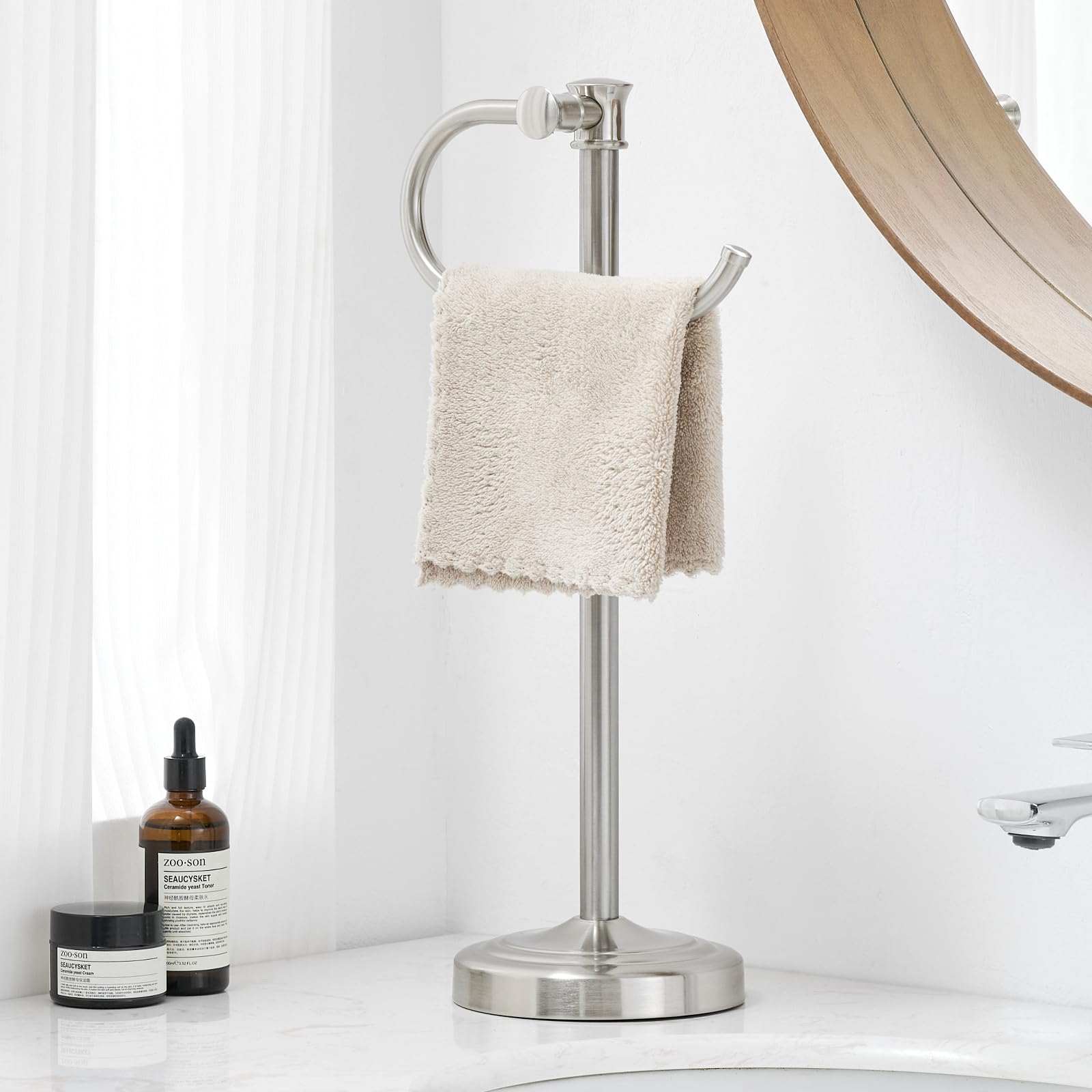 BESy 17-inch brushed nickel towel bar stand keeps towels tidy and accessible.