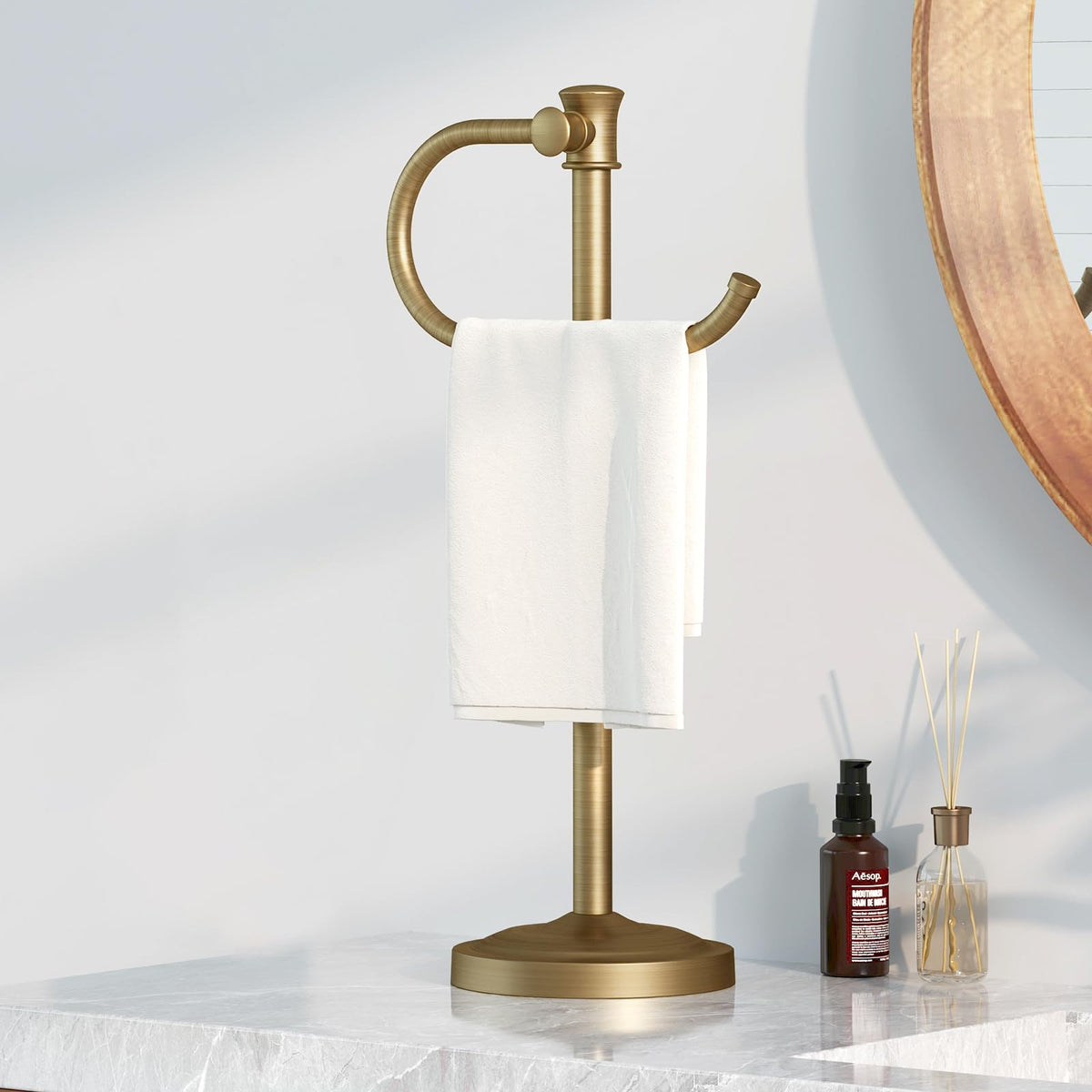 BESy antique brass towel bar stand provides durable elegance for any bathroom.