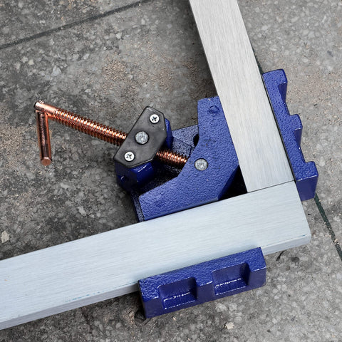Sturdy cast iron frame provides rigidity for demanding welding tasks.