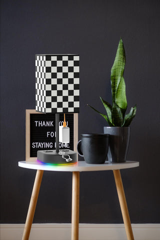 Checkerboard fabric shade close-up highlights stylish design.