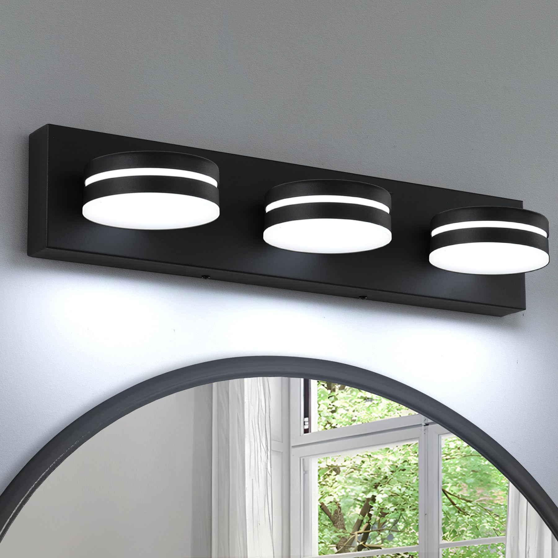 Bicrink vanity light 3-light over mirror provides even illumination.