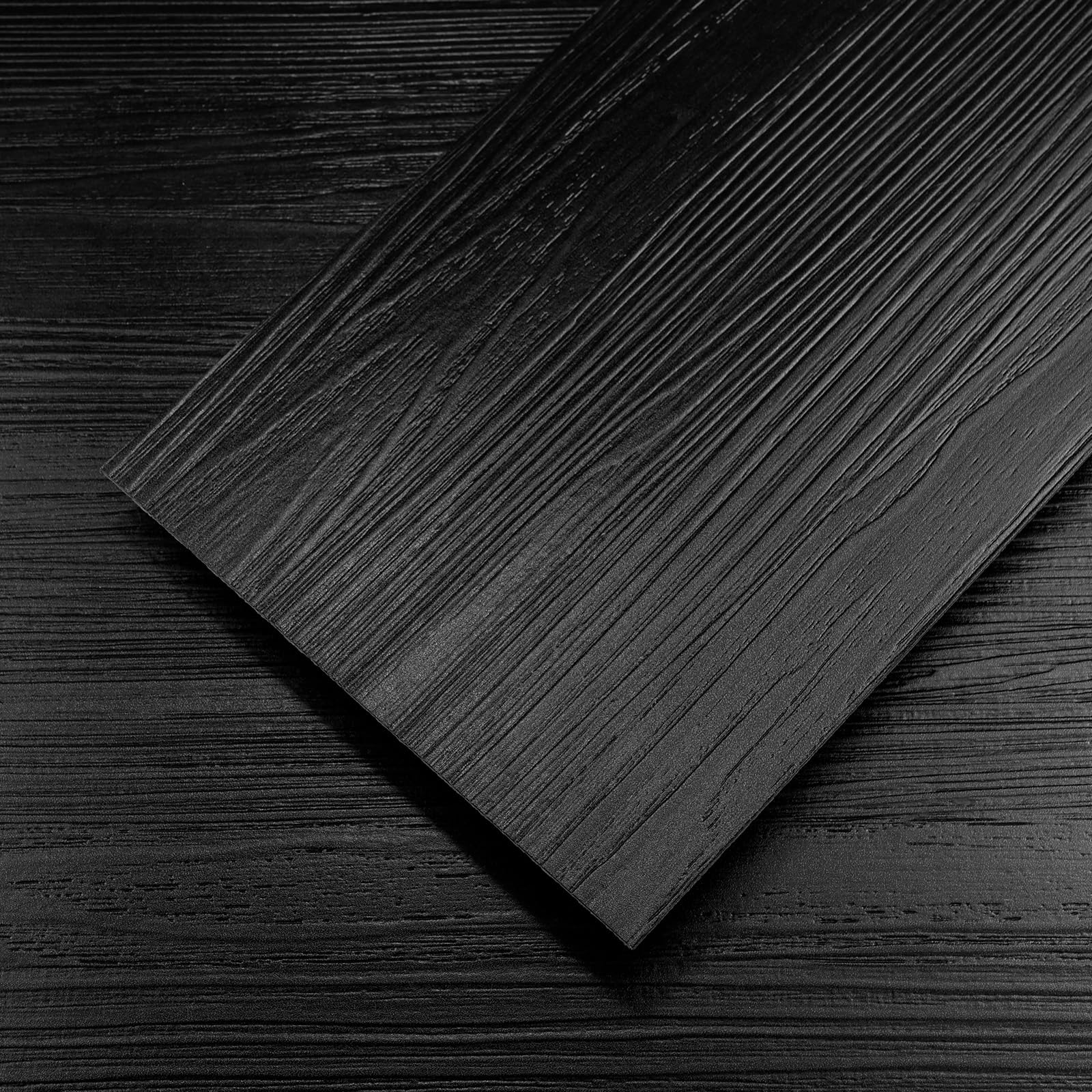 Biyoee black wood vinyl plank tiles for quick peel-and-stick installation.
