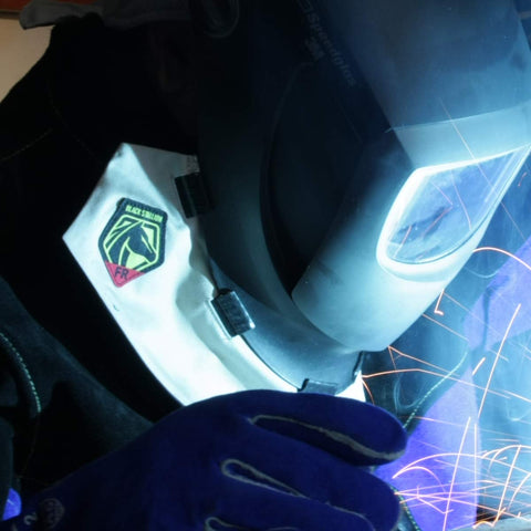 Black Stallion AH2140-NS lightweight FR cotton bib offering flexible welding protection