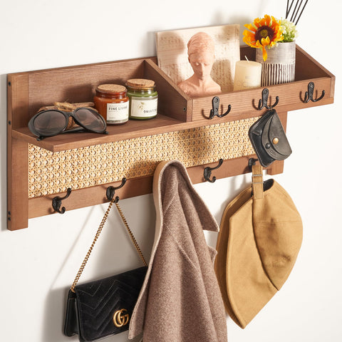 Blossome coat rack's pinewood frame delivers sturdy wall-mounted storage for coats and bags.