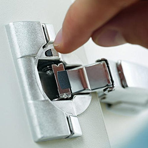Blum Clip Top hinge packaging showing screws and caps included for easy setup