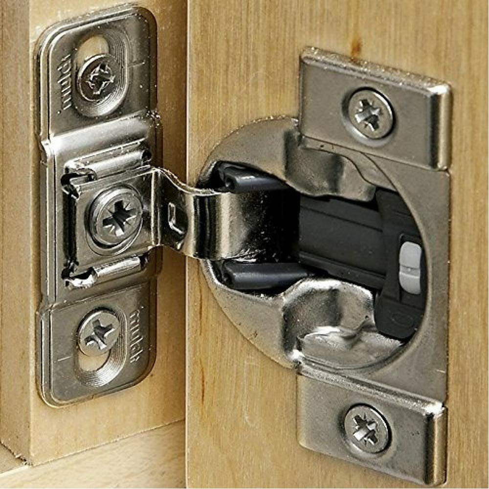 Blum hinge set contents; two hinges and eight screws for a quick cabinet upgrade