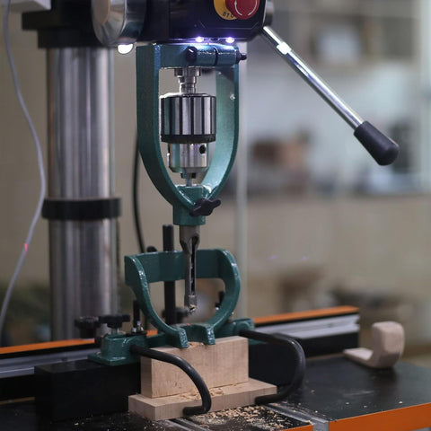 BMTURNING mortising attachment press block stabilizes drilling.