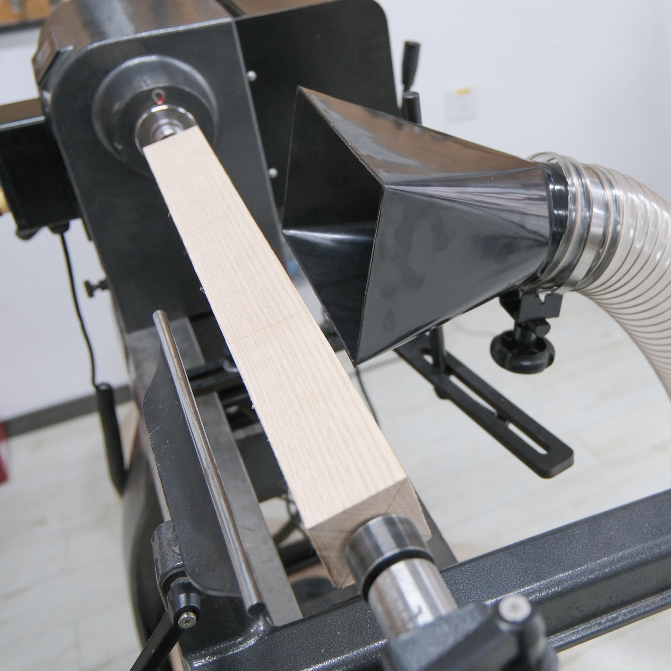 BMWOOD dust hood close-up showing compact design for tight spaces in the workshop.