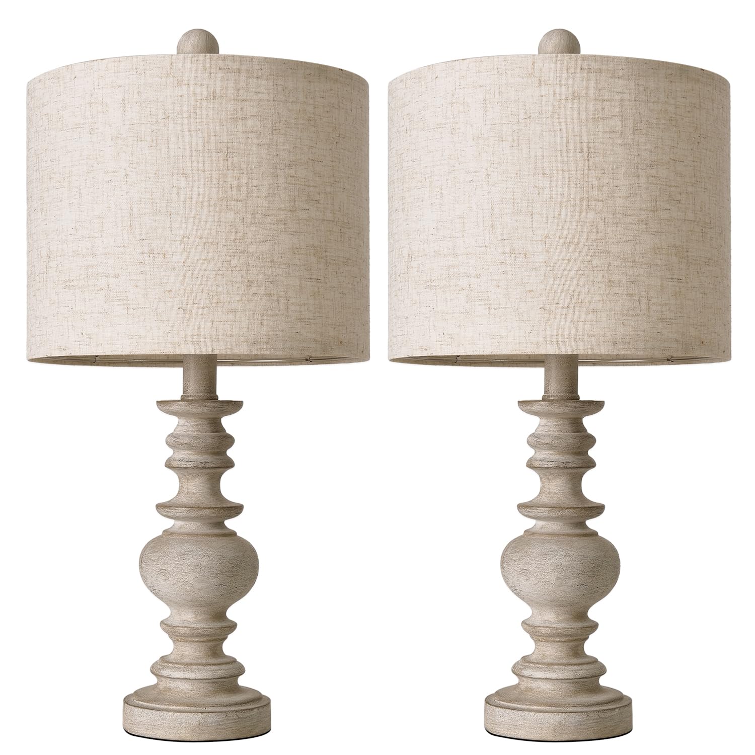 BOBOMOMO bedside lamps create a warm ambiance on a nightstand.
