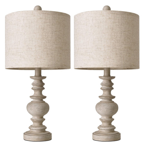 BOBOMOMO bedside lamps create a warm ambiance on a nightstand.