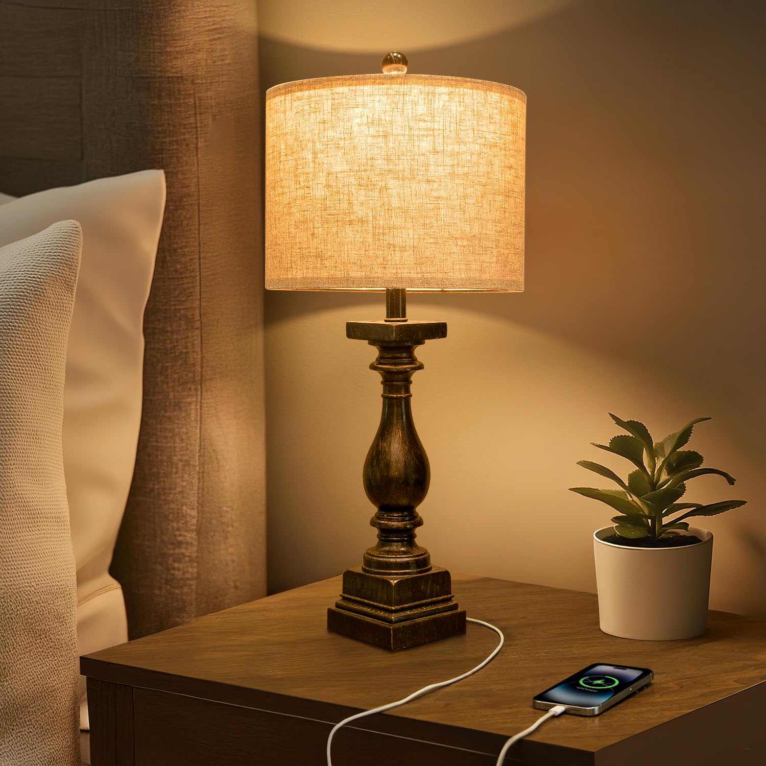 Soft-lit bedside lamps with linen shades for relaxing evenings