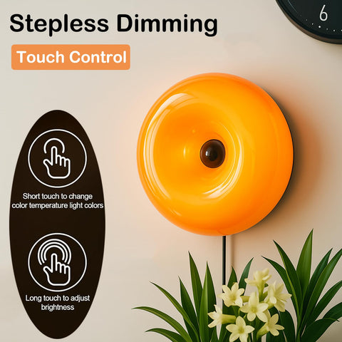Bedside setup featuring the Bofea orange donut lamp