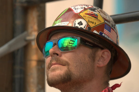 Protective safety eyewear meeting Z87 standards in a stylish two-tone design.