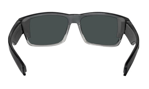 Wrap-around BOMBER safety glasses with oversized lenses for wide field of view.