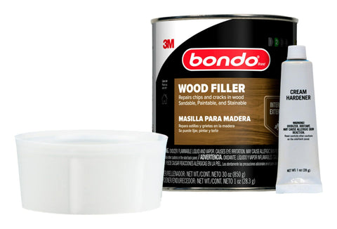 Paintable and stainable Bondo Wood Filler on a repair patch for a natural look.