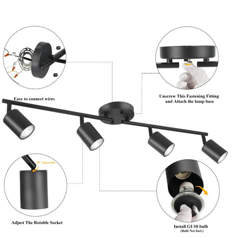 BoostArea black finish spotlights provide focused illumination for art displays.
