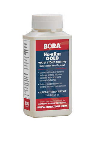 BORA HoneRite Gold bottle being poured, revealing rust-inhibiting honing solution.