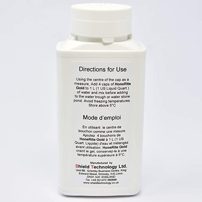 Close-up of BORA HoneRite Gold liquid with anti-corrosion formula for tools.