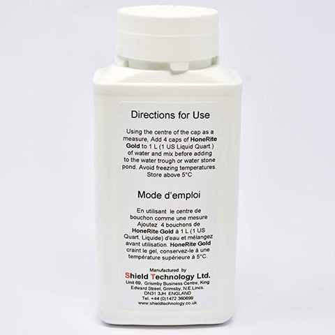 Close-up of BORA HoneRite Gold liquid with anti-corrosion formula for tools.
