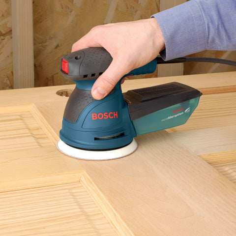 Bosch ROS20VSC palm sander micro-filter dust system captures fine particles.